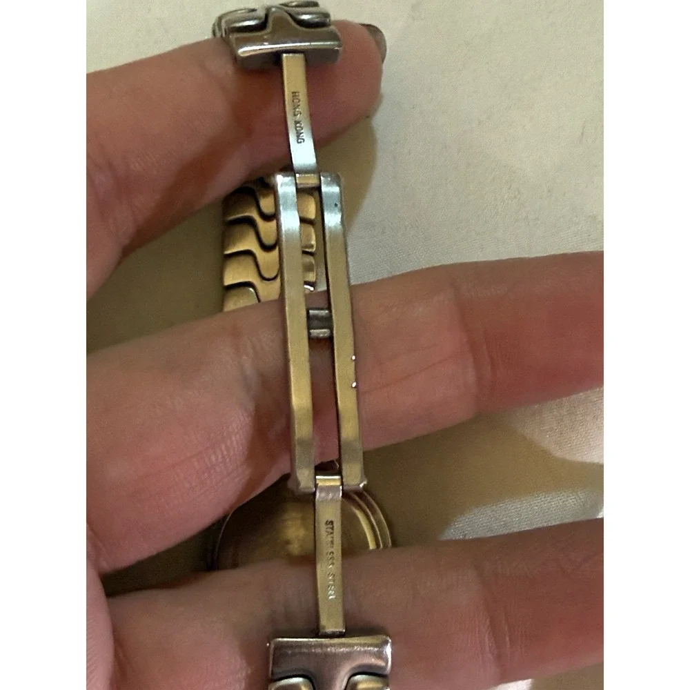Bulova Women's Stainless Steel Quartz Watch Water-Resistant Date Silver